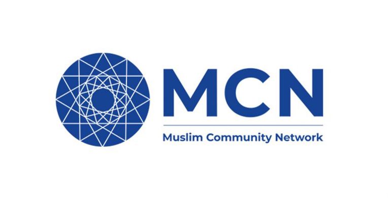 A blue and white geometric logo on the left of the letters "MCN" and reads "Muslim Community Network" underneath it all in blue.​​ 